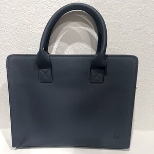 Beautiful navy structured laptop bag with beautiful gold and key lock detail